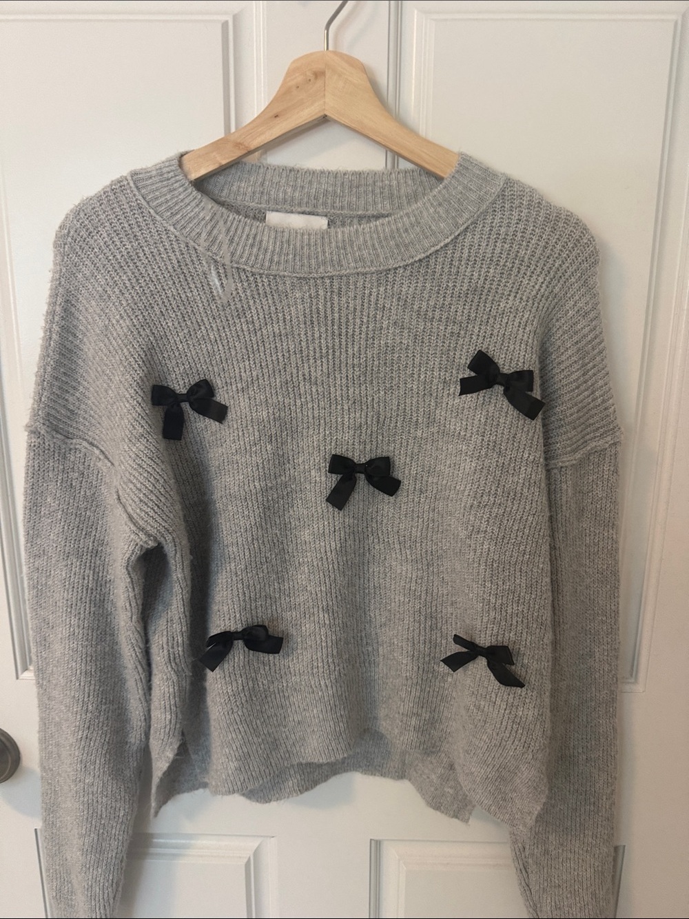 Pink Rose Light Gray Crewneck Sweater with Black Bow Accents
